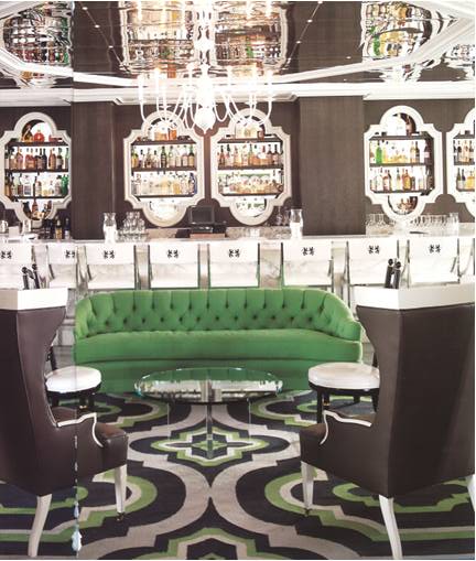 Kelly green, chocolate brown and marble white used in part with bold graphics make for a mesmerizing bar setting.  And who doesn't love a mirrored ceiling?