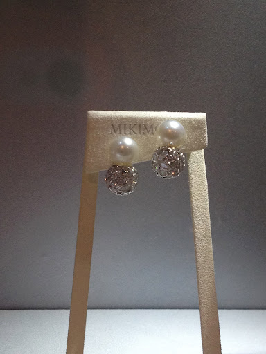 Nobody does pearls like Mikimoto. But they also do amazing things with diamonds. These pearl earrings are accented by a small ball with the diamonds set to be reminiscent of a dandelion. Nobody does pearls like Mikimoto. But they also do amazing things with diamonds. These pearl earrings are accented by a small ball with the diamonds set to be reminiscent of a dandelion.