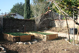 Our backyard Raised Bed Garden. Have a garden like this installed in your home: http://gardens.thegrowinghome.net