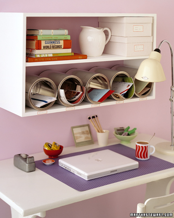 Don't let your desktop disappear under piles of paperwork. Inexpensive, unused cans can be purchased at paint stores; lined up on a shelf and anchored in place with Velcro, they become organizing cubbyholes with a modern flair. Don't let your desktop disappear under piles of paperwork. Inexpensive, unused cans can be purchased at paint stores; lined up on a shelf and anchored in place with Velcro, they become organizing cubbyholes with a modern flair.