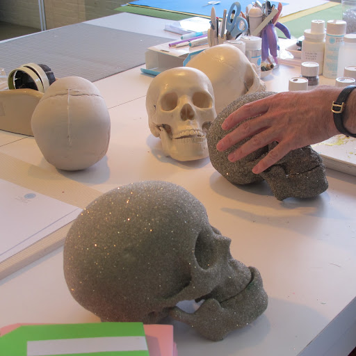 The sparkly skulls are from last year's decorations; I'm recycling and I want them (plus some additional skulls and bones) to have a fresh look!
