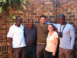 Both of our principals drove us (with each of their cars) to the capital city of Pretoria, 6 hours away, to see us off. They also brought Israel, the clerk of Welani school, another one of our best friends there. We had a great time with them and were so happy that that was the method of our departure from the village. Our last time to see them. South Africa - 541.jpg