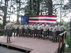 The staff performs the traditional American Heritage program on Friday evenings, treating Scouts and leaders to song and spoken words, telling the story of the history of the United States in an engaging campfire presentation.