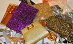 Holy shine: Three glittering clutches from Anya Hindmarch (anyahindmarch.com) and the bottom gold number is from Kara Ross (kararossny.com).
