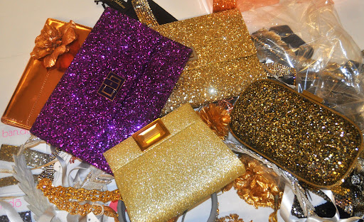 Holy shine: Three glittering clutches from Anya Hindmarch (anyahindmarch.com) and the bottom gold number is from Kara Ross (kararossny.com). Holy shine: Three glittering clutches from Anya Hindmarch (anyahindmarch.com) and the bottom gold number is from Kara Ross (kararossny.com).
