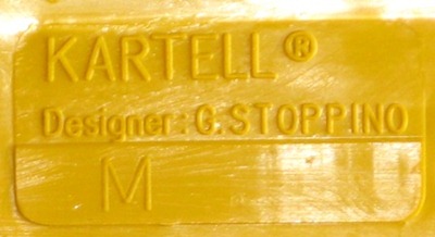 Kartell Stoppino 4675 magazine rack, yellow imprint