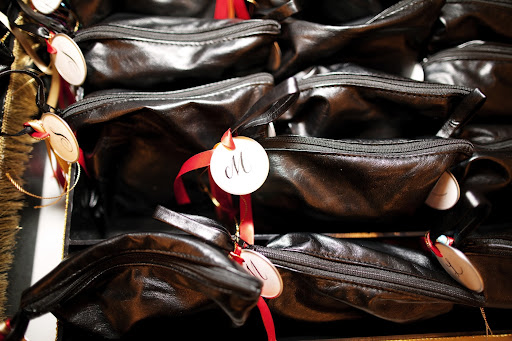 We distributed fold-up ballet flats as the dancing started. My sister, Maggie, calligraphed the sizes onto circular tags. We distributed fold-up ballet flats as the dancing started. My sister, Maggie, calligraphed the sizes onto circular tags.
