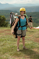 All geared up, she was ready to take to the skies! We're guessing it was a parachute in the bag, and not just a comfy seat.