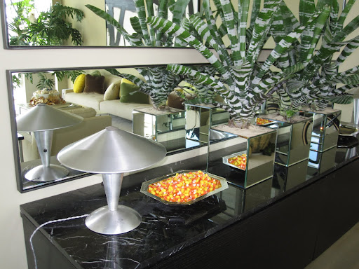 I placed candy corn in small silver bowls around the living room for guests to enjoy.