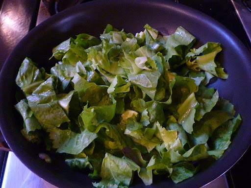 Sliced escarole ready to be sauteed.