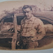 Man in Plaid with Car