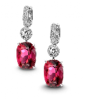 We love the idea of adding a dash of bold color to your wedding day look. Jeffrey Bilgore's platinum, diamond and rubelite earrings would do just that!