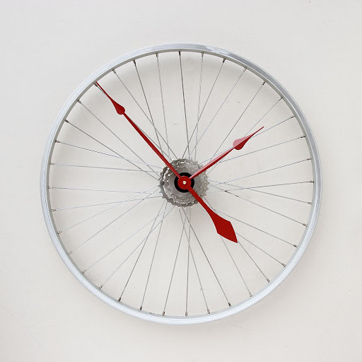 The bike wheel translates well into a clock. (Handmade Geekery on etsy.com)