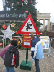 an_ The kids reading the santa post box instructions_jpg.jpg