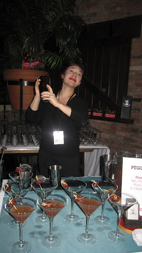 This lady from Pegu Club looked happy making a Plum Lady (gin, plum wine, plum brandy and cherry liqueur).