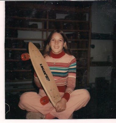 A young Robin holding her new kicktail board. Look at those wheels, I think they are O.J's