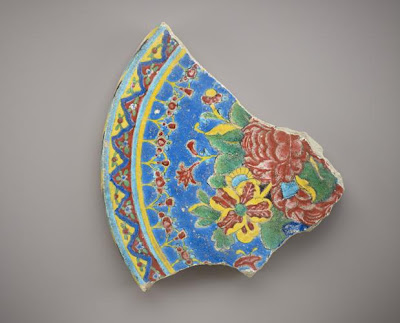 Fragmentary tile | Origin:  Shiraz?,  Iran | Period: 18th century | Details:  Not Available | Type: Cuerda seco earthenware | Size: H: 23.9  W: 26.1  cm | Museum Code: F1908.110 | Photograph and description taken from Freer and the Sackler (Smithsonian) Museums.