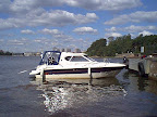 Motorboat by the dock Motorboat by the dock