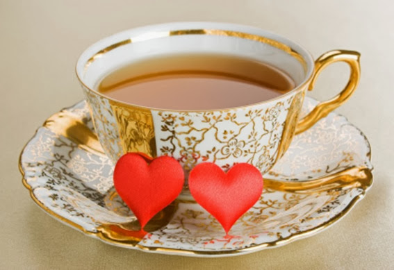 gold trim teacup with hearts