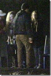 EXCLUSIVE: Kristen Stewart and Robert Pattinson kiss and ride a motor bike at the Twilight wrap party in Canada
