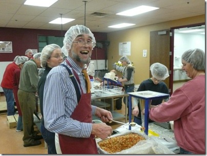 Thomas Malloy, volunteering at Feed My Starving Children