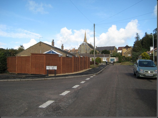 Looking up Summervale towards the blocked off road. Methodist church at top.  We steered many a home-made trolley down this road without any fear of cars hindering our descent!