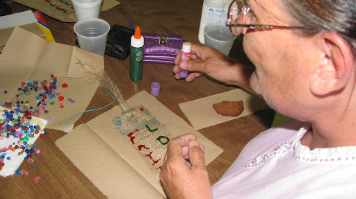 Betty McKelvy finishes her bookmark.