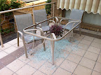 Dec 19 - Shattered! Our patio table smashed in a wind storm