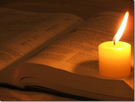 candle on bible