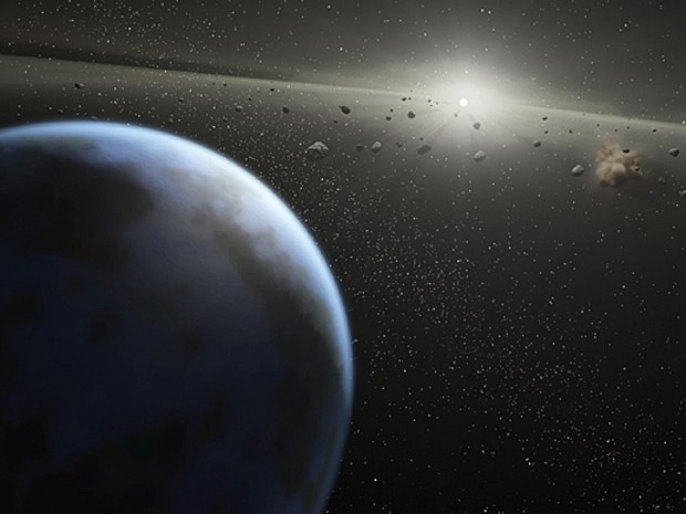 Concepção artística divulgada pela Nasa mostra cinturão massivo de asteroides viajando ao redor de uma
