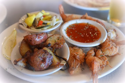 tender roasted potatoes with caramelized onions, sweet chili sauce for the coconut shrimp and delicate tender crisp veggies in a lemony light sauce