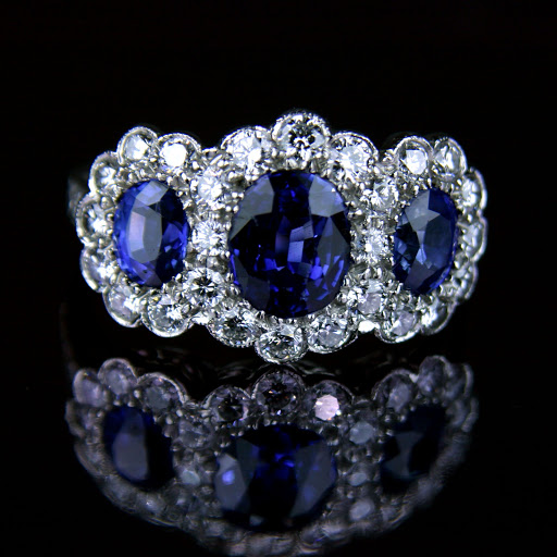 Triple Ceylon sapphire and diamond cluster engagement ring I snapped for our
