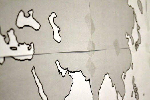closeup of taped paper for map art