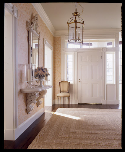 A marble shelf with carved brackets is the perfect fit for this formal entry. A marble shelf with carved brackets is the perfect fit for this formal entry.