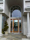 Clear transom glass with leaded clear beveled door and side lights.