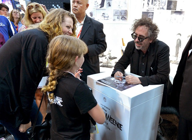 SAN DIEGO, CA - JULY 12:  Director/producer Tim Burton sign autographs during Comic-Con International 2012 at San Diego Convention Center on July 12, 2012 in San Diego, California.  (Photo by Alberto E. Rodriguez/WireImage)