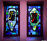 Left: Peter with the keys (Matthew 16:19)
Right: Peter's brother Andrew is said to have been crucified on what has later been known as an Andrew's Cross. StainedWindows-0999.jpg