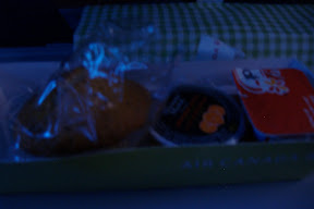 Breakfast - muffin, orange juice, and yogurt