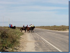 6025 Texas, South Padre Island - horseback riders crossing Padre Blvd