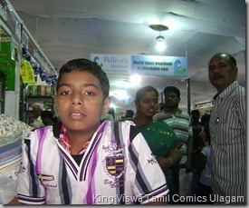 CBF Day 13 Photo 33 Stall No 372 This family is from Sivakasi Buying comics in Chennai