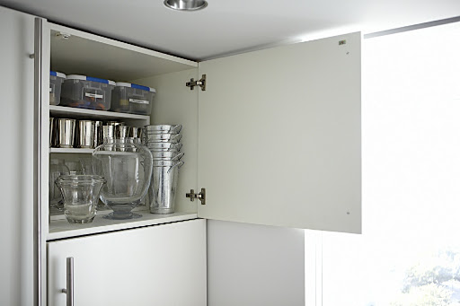 This idea did run in the article but I thought I would give you a more detailed view. The cabinet above my refrigerator is the perfect place for my flower arranging supplies. This idea did run in the article but I thought I would give you a more detailed view. The cabinet above my refrigerator is the perfect place for my flower arranging supplies.