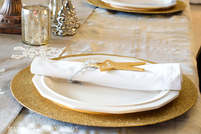 Gold White silver and mecury glass Christmas tablescape. A delightful Dining Room Holiday Tour. See how Mrs Major Hoff decorates for Christmas. The tour features table decorations, dining room decorating ideas, place settings and an idea for homemade Christmas gift that can be personalized for your holiday guests. This post is part of the Home For The Holidays Blog Tour. Gold White silver and mecury glass Christmas tablescape. A delightful Dining Room Holiday Tour. See how Mrs Major Hoff decorates for Christmas. The tour features table decorations, dining room decorating ideas, place settings and an idea for homemade Christmas gift that can be personalized for your holiday guests. This post is part of the Home For The Holidays Blog Tour.