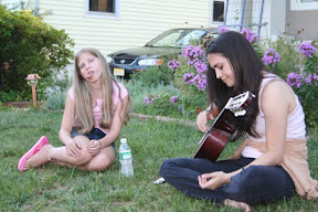 Actresses Remy Speirs and Erikka Walsh relax between shots.