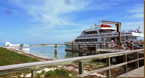 The Yanke Freedom II ferry and Key West Adventure seaplane at the docks in the Dry Tortugas