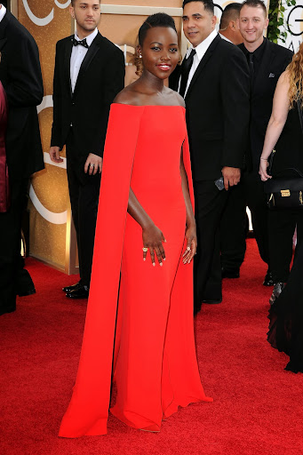 Seeing Red: While it has often been dubbed taboo to sport fire engine red on a like-hued carpet, starlets of all ages proved that it can be done perfectly last night. Case in point: Lupita Nyong’O wearing Ralph Lauren Collection. Seeing Red: While it has often been dubbed taboo to sport fire engine red on a like-hued carpet, starlets of all ages proved that it can be done perfectly last night. Case in point: Lupita Nyong’O wearing Ralph Lauren Collection.