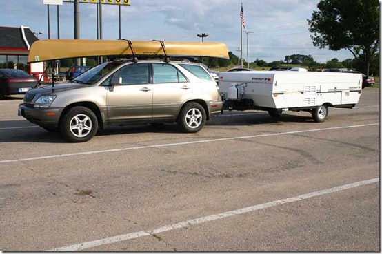 car canoe and camper
