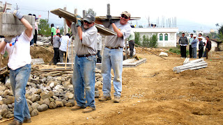3 Gringos carrying concrete slabs. Gringo loco...Ira, Dave, Jason.Photos by TOM HART