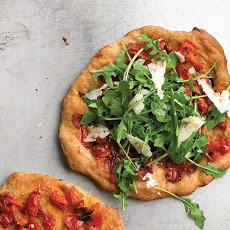 Individual Pizza with Arugula and Tomatoes