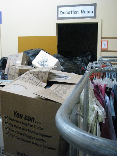 Volunteers are always needed to sort through the donations. (Photo by: Kenrick Nobles)