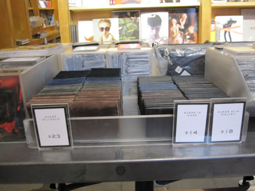A variety of Marc Jacobs suede wallets can be found in the front of the store.